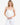Model wearing double-layer fitted cami top with scoop neckline, styled for minimal, everyday layering, studio background