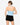 Model wearing powder blue halter neck open-back top with buckle detail, styled for a bold, chic look, studio background