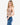Model wearing new taupe ribbed double-layer tube top, styled for a casual, modern look, studio background
