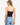 Model wearing black ribbed double-layer tube top, styled for a minimal, versatile look, studio background