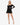 Model wearing black off-the-shoulder stretch lace top with long sleeves, styled for an elegant, feminine look, studio background